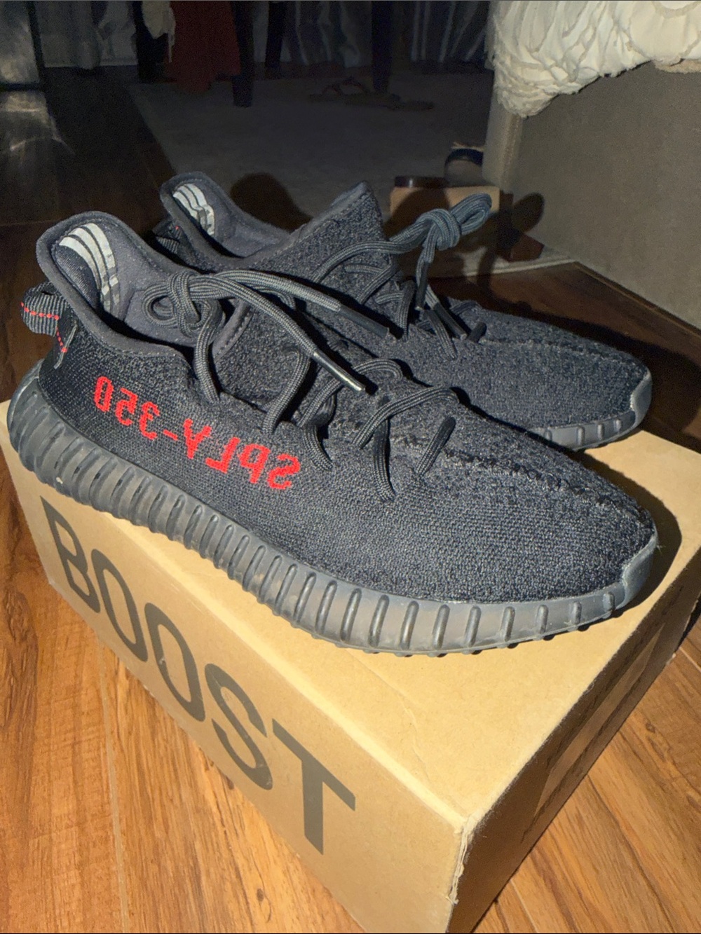 Yeezy Boost 350 V2 Black with Red Accent Sneakers